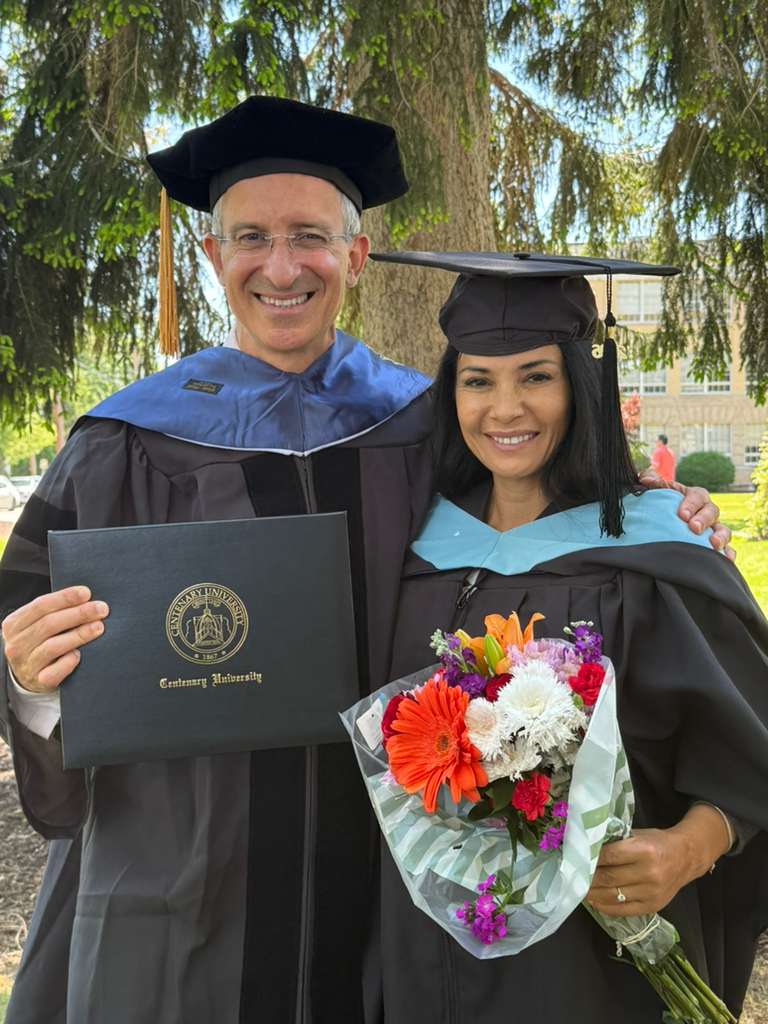 Nevriye at her Master's graduation with Dr. Tal Ben-Shahar
